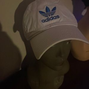 White blue Adidas sign